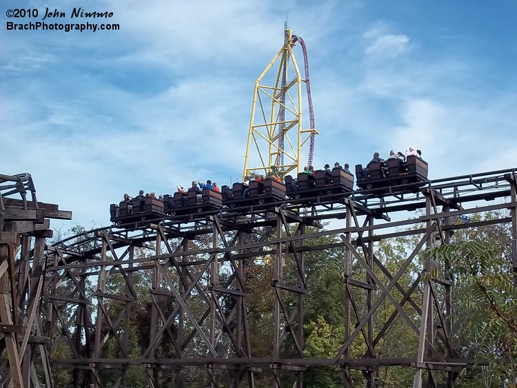 No comparision here - Top Thrill Dragster is taller than Cedar Creek Mine Ride.