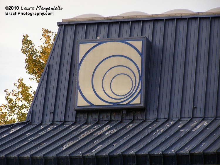 Corkscrew doesn't have a sign spelling out C-O-R-K-S-C-R-E-W like most of the other coasters at Cedar Point do.  This one just has a light box with a bunch of circles on it.  When you look at it - it does look like you're looking into a Corkscrew.  Huh.