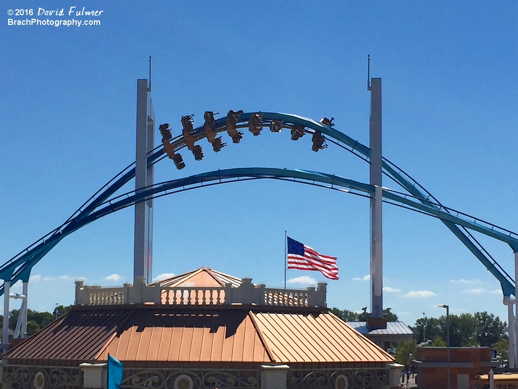 GateKeeper train twisting riders around to go through the other keyhole to the right.  (frame 3 of 4)