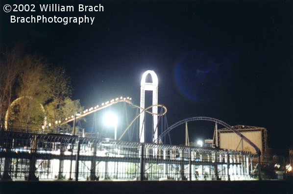 Lift hill lit up at night.