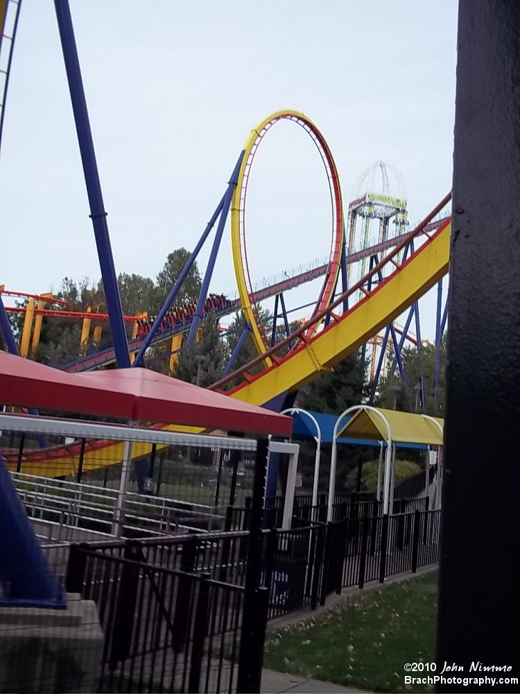 There's a Mantis train going up the lift hill and the first thing the train will encounter on the journey is the enormous vertical loop.