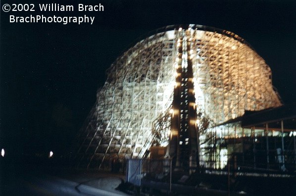 Flood lights illuminating Mean Streak's massive wooden structure.