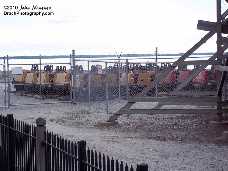 Mean Streak train cars sitting on shipping pallets waiting for their offseason rehab and maintenance.