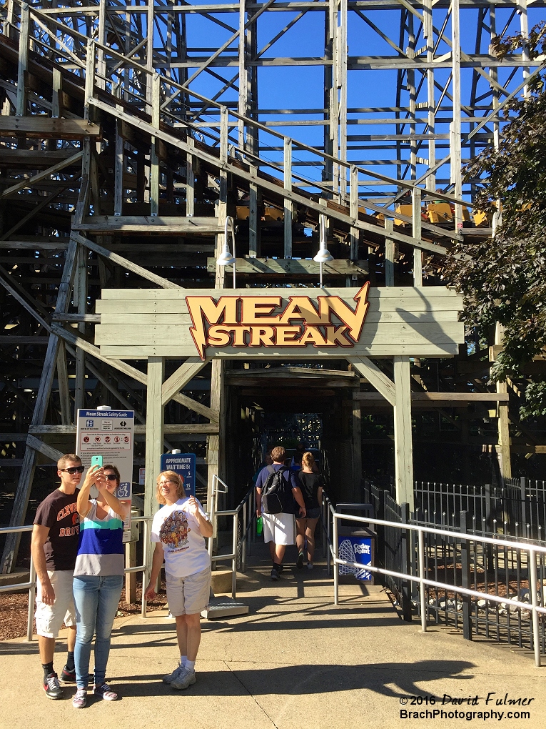 Entrance to Mean Streak and sculture of the sign hanging the entrance sign.