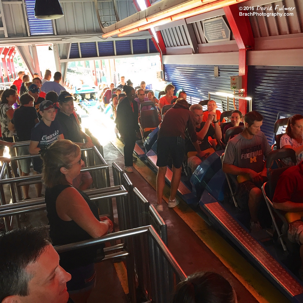 Inside the Millennium Force station, the blue train gets checked before dispatching out.