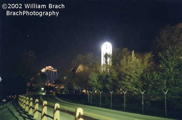 A white Power Tower illumnated in white lights at night is very bright.