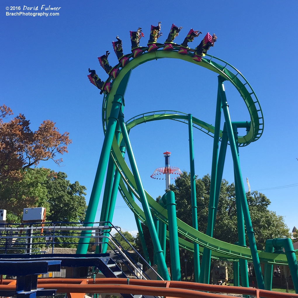 Raptor train entering the Cobra Roll seen from Valravn's queue line. (frame 2 of 3)