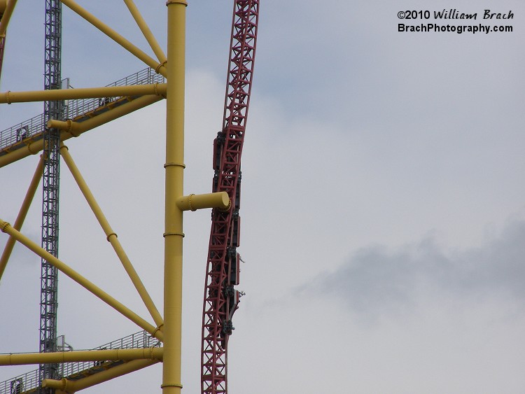 Red train going through the downward spiral on Top Thrill Dragster.