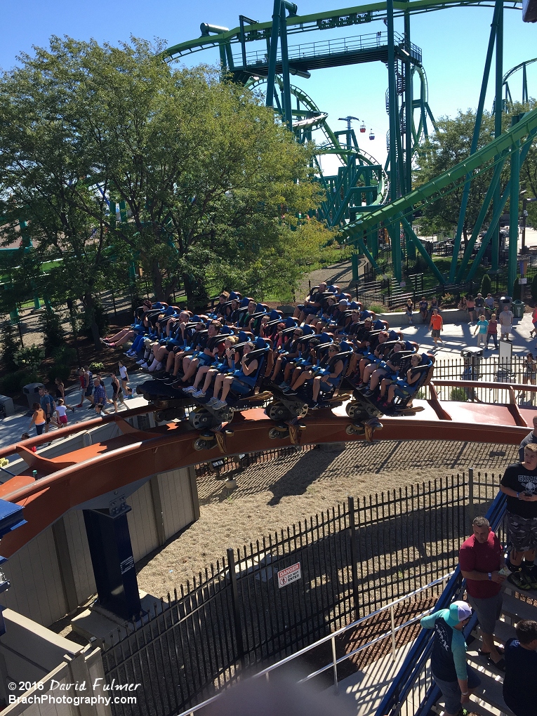 Train leaving from train station and headed to the lift hill.  (frame 1 of 5)