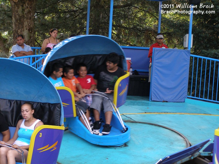 Tilt-a-Whirl in motion.