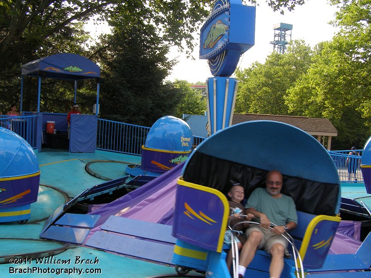 Good to see these people enjoying their ride on Tilt-a-Whirl.