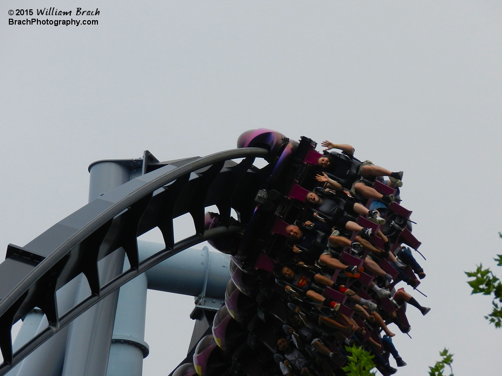 Train going into a turn full of riders.