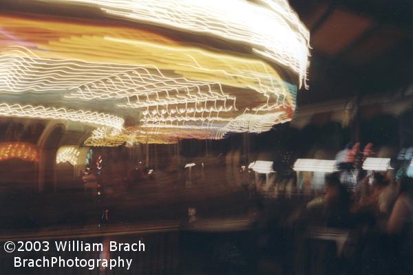 Lights in motion on the Carousel at night.