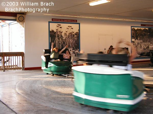 Hersheypark's Whip ride.  Up on the wall, the park has historical photos of past rides.