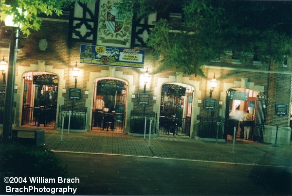 Nightime view of the front gates to Hersheypark.  Notice the blue sign?  Advertising NEW for 2004 - Storm Runner!