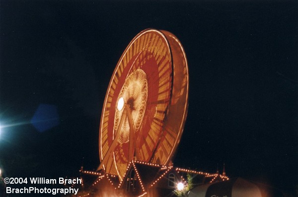 The wheel in motion at night.