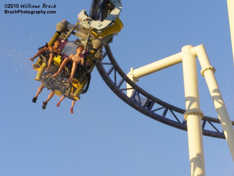 People on the ground can utilize the multiple water cannons on the ground in the water play area to shoot riders with water.