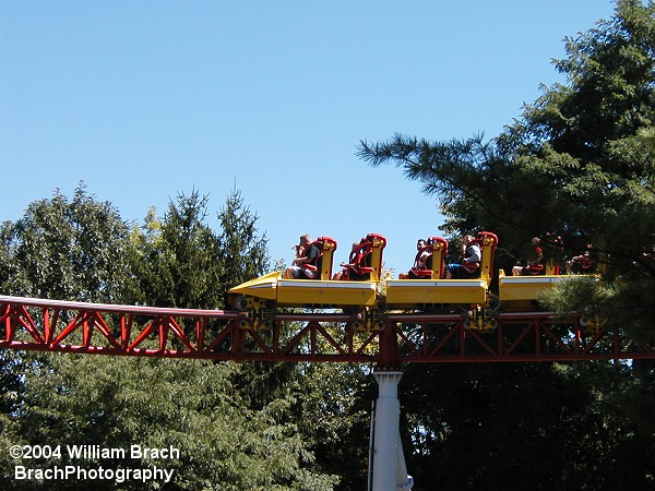 Storm Runner train making its way to the station after leaving the brake run.