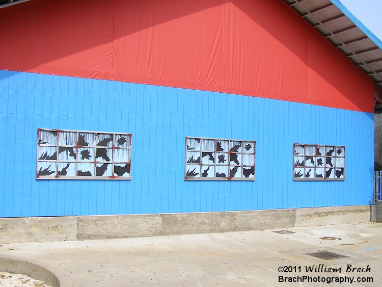 This building was originally the landing building for the Sky Ride.  It was later converted into a playhouse for KidzVille and now it's the Doll Factory used at Halloween Haunt.