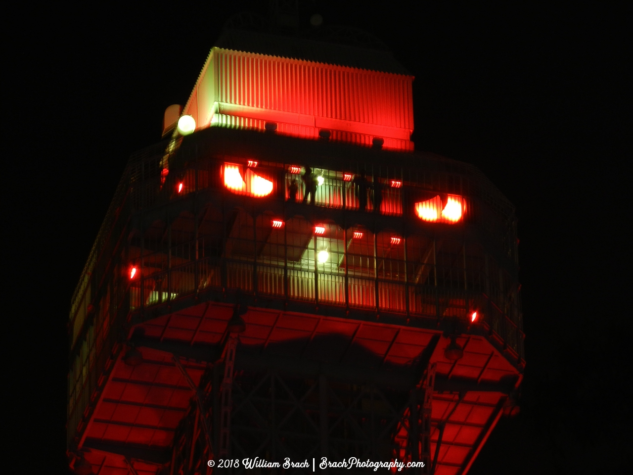 The evil Eiffel Tower lit up during Halloween Haunt.