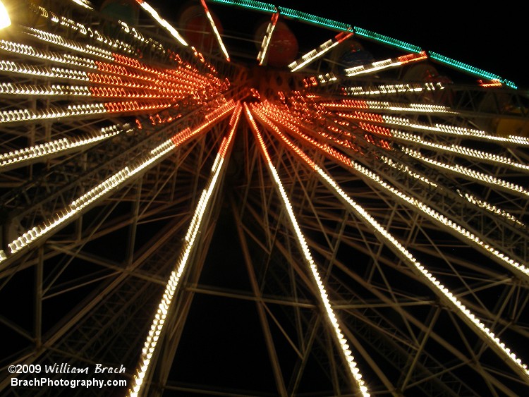 Giant Wheel all lit up at night.