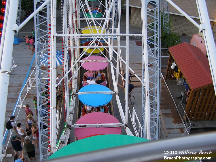 Looking down at the loading station and several of the gondolas.