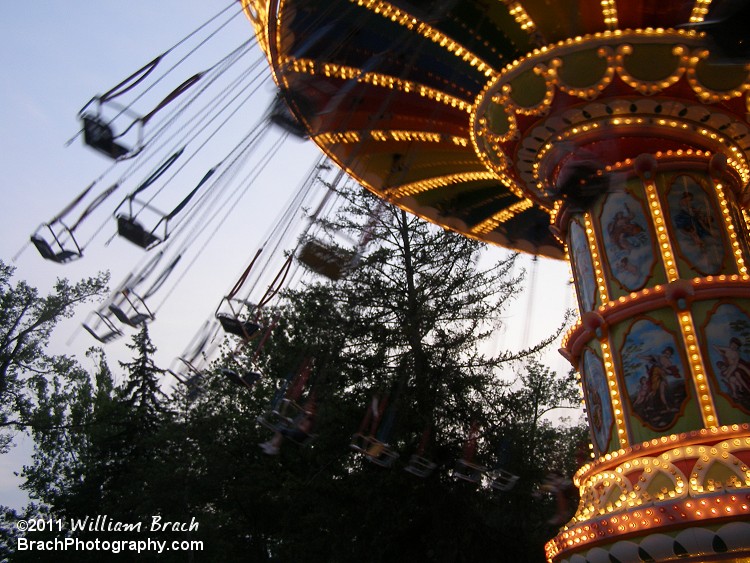 Here we see the ride lit up and in motion at dusk.