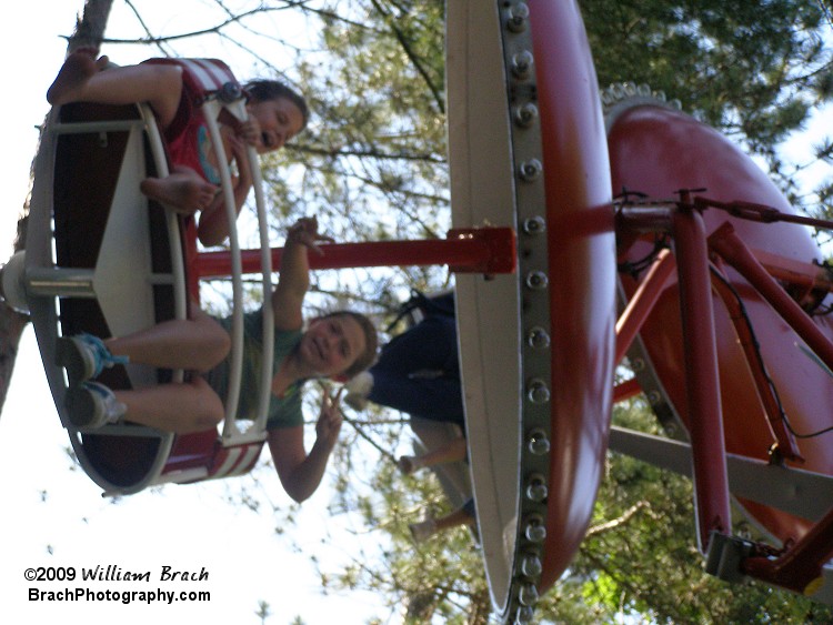 These girls are having fun riding Paratrooper at Knoebels.