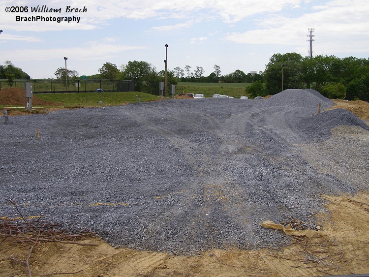 Shifting gravel around to level off the land for the coaster.