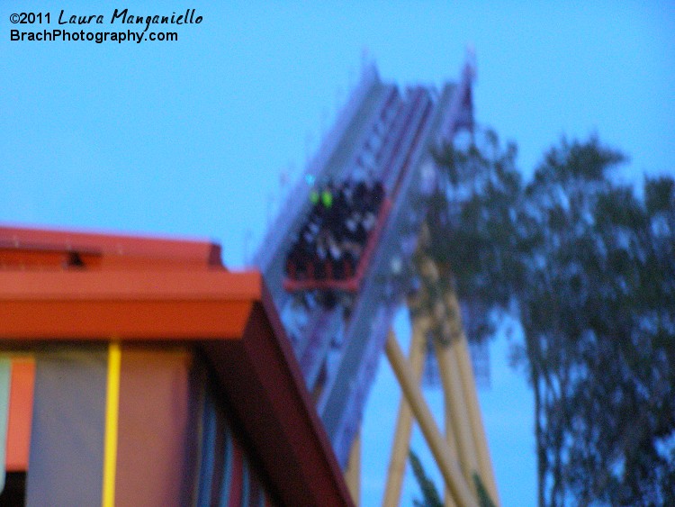 Yup.  That's me in the yellow shirt.  If you look directly above me, you'll see a bright blue spot.... That's my LED lit glow glove that I was wearing while riding the coaster!