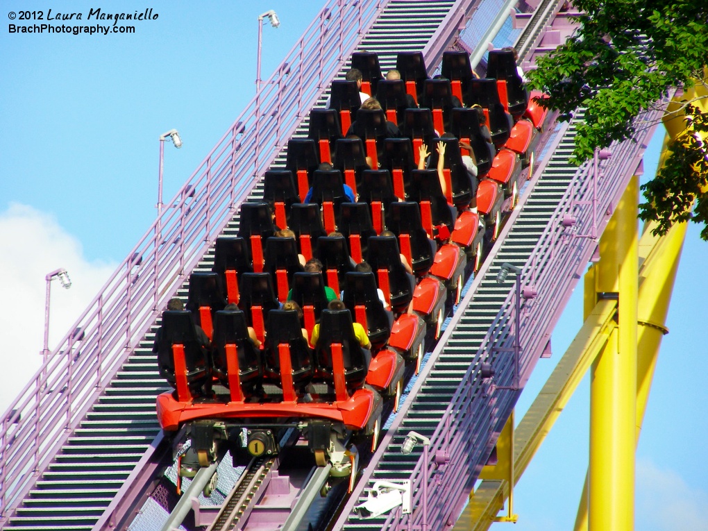 Apollo's Chariot train climbing the lift hill.