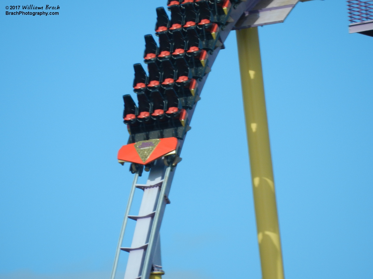 An empty train taking a test run before the park opens up for the day.