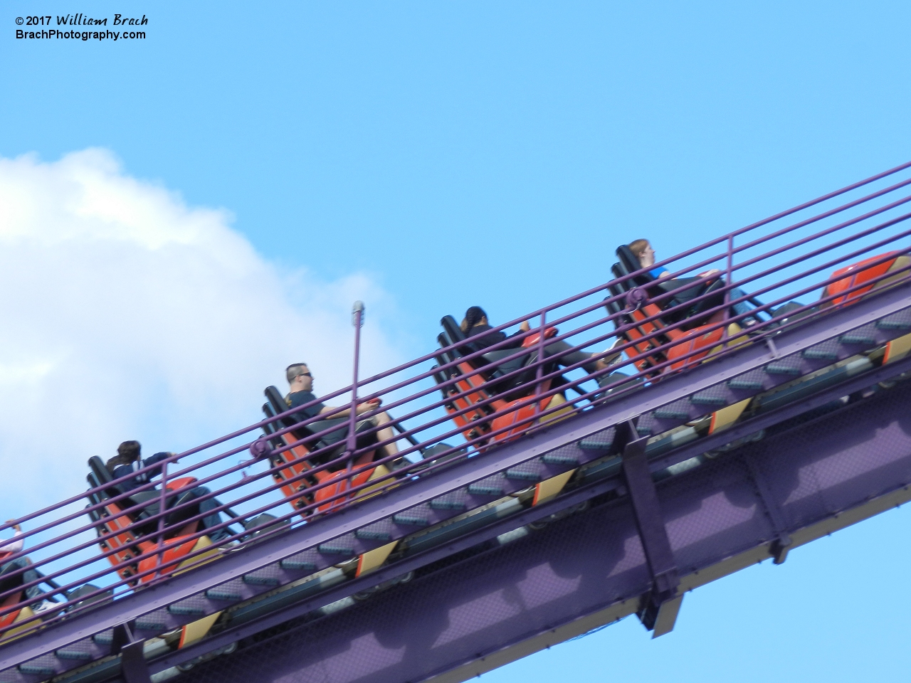 Apollo's Chariot train climbing the lift hill.