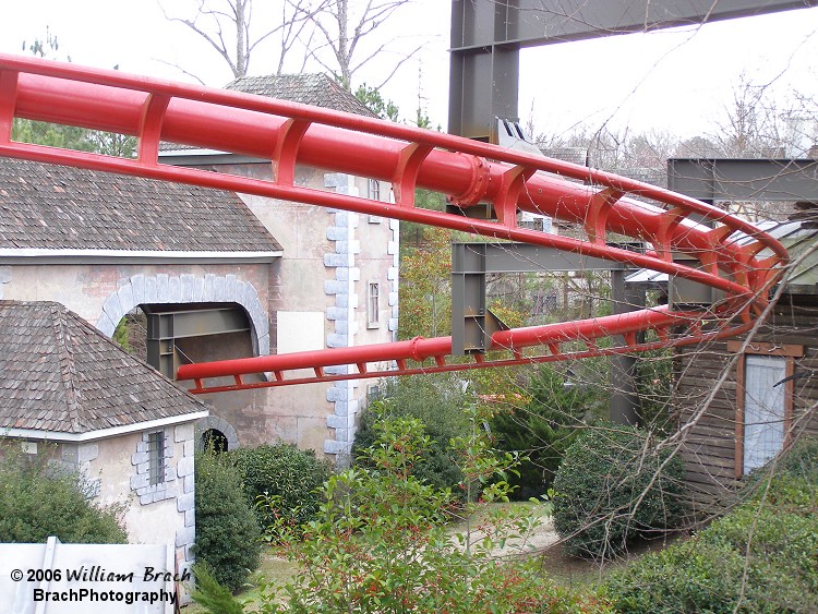 This coaster was themed to represent wolves running amok through a village.  Hence the buildings that were built as supports for the ride.