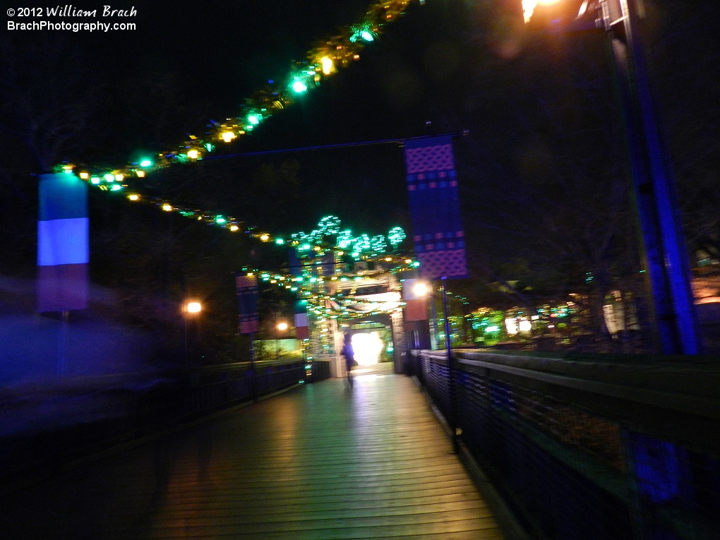 Night view of the bridge leading to Ireland at Christmas Town.