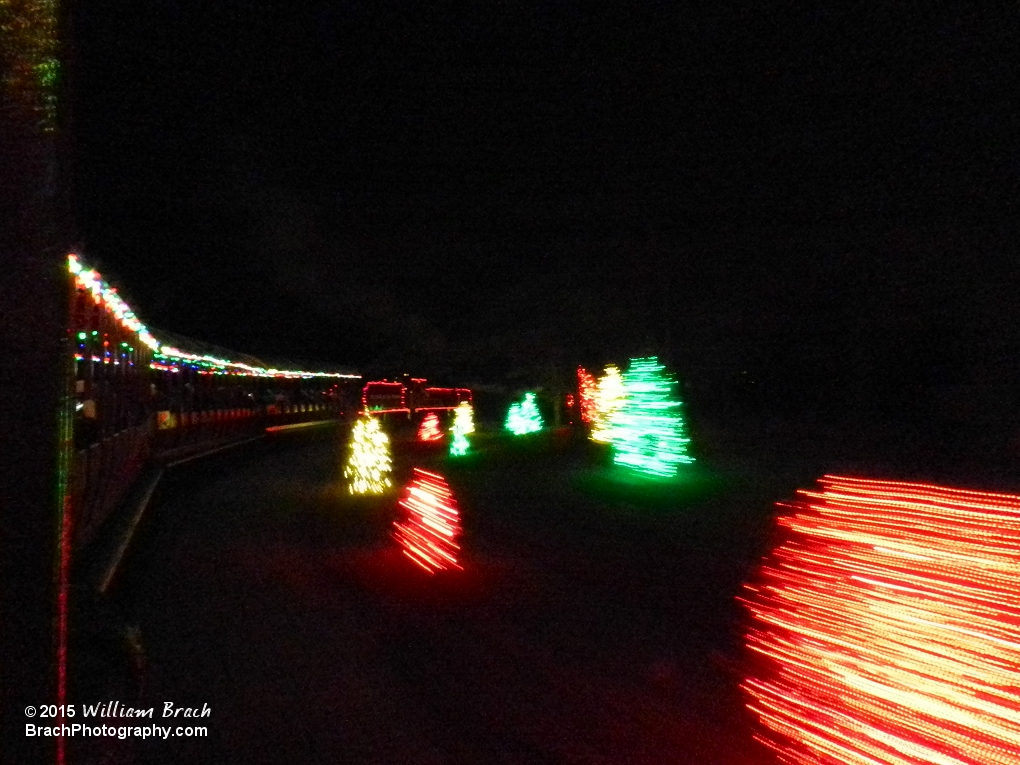 Zooming past decorated trees between New France and France.