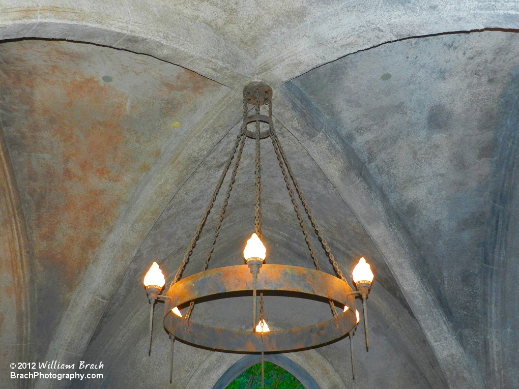 Detailed view of the torch chandilier inside the queue line on DarKastle.