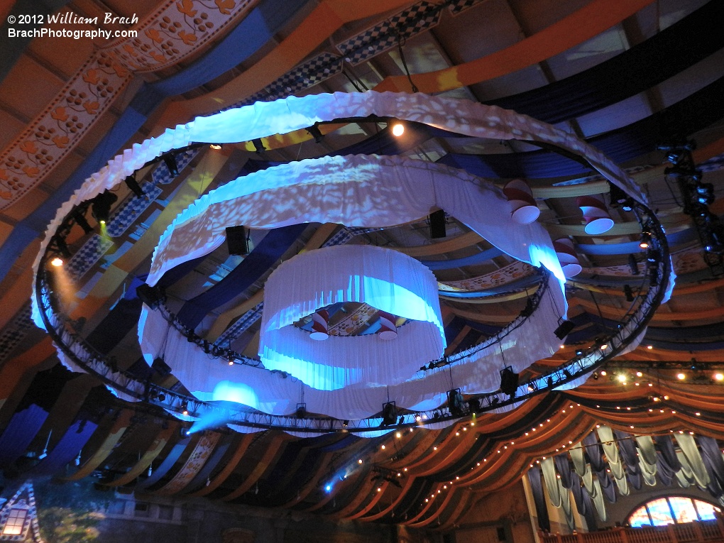 Looking up at the decorative curtains over the stage.