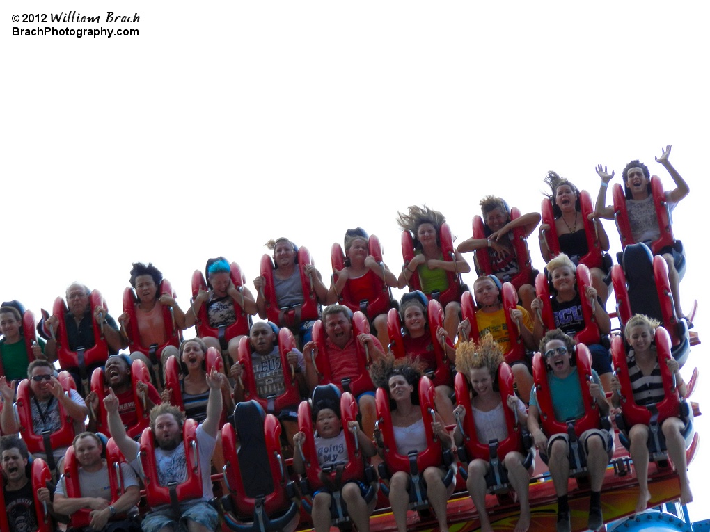 Griffon's riders reacting to the sudden release of the brakes that sends them flying down through the first drop.