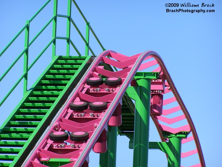 Detailed view of the lift hill.  This coaster does not use a traditional chain lift, but uses motors and wheels pushing fins underneath the train up the hill.