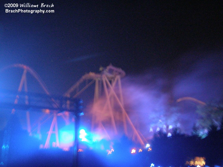 Lots of colorful lights flood the park at Howl-O-Scream.  Griffon is seen here.