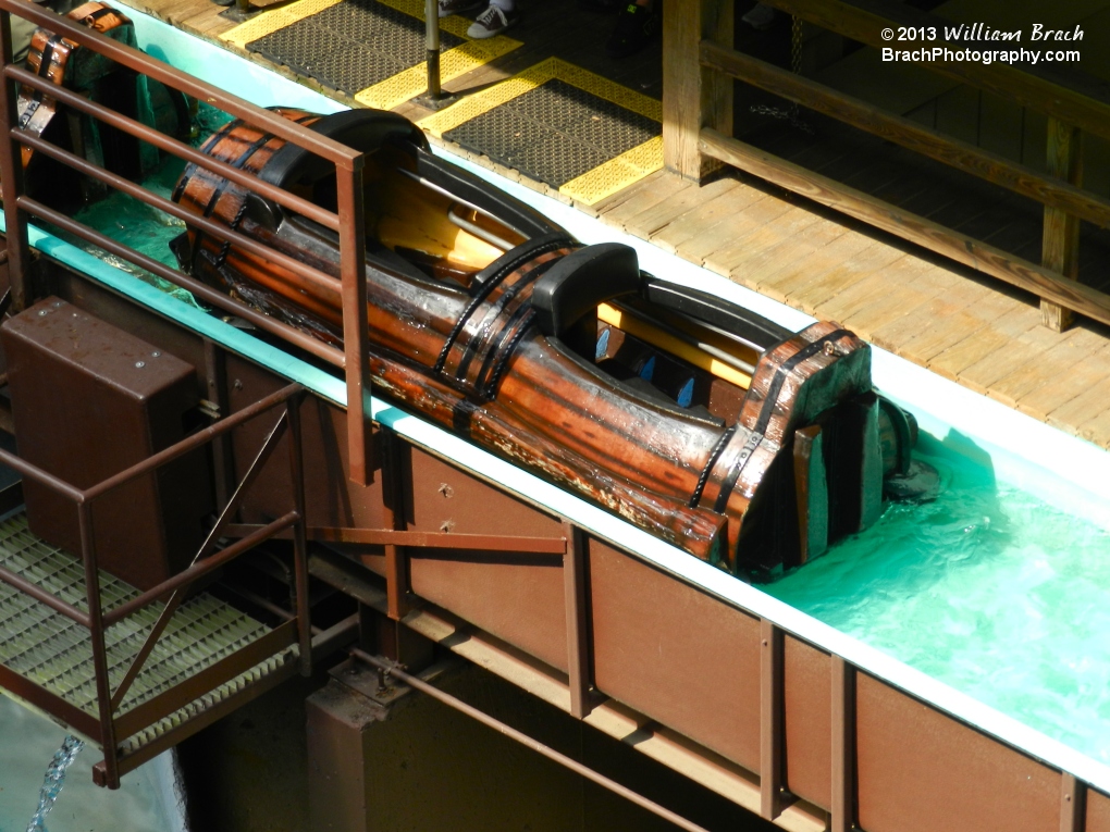 An empty log awaits its next passengers in the Le Scoot station.