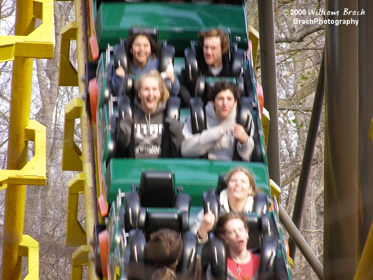 Closeup of the riders going through the loop.