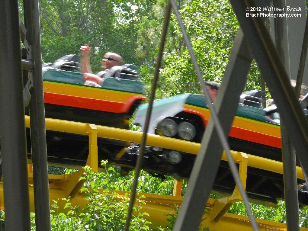 Train running the course through the supports.