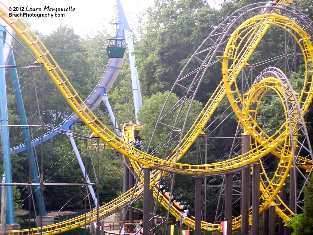 Loch Ness Monster train running towards the brake run outside the station.