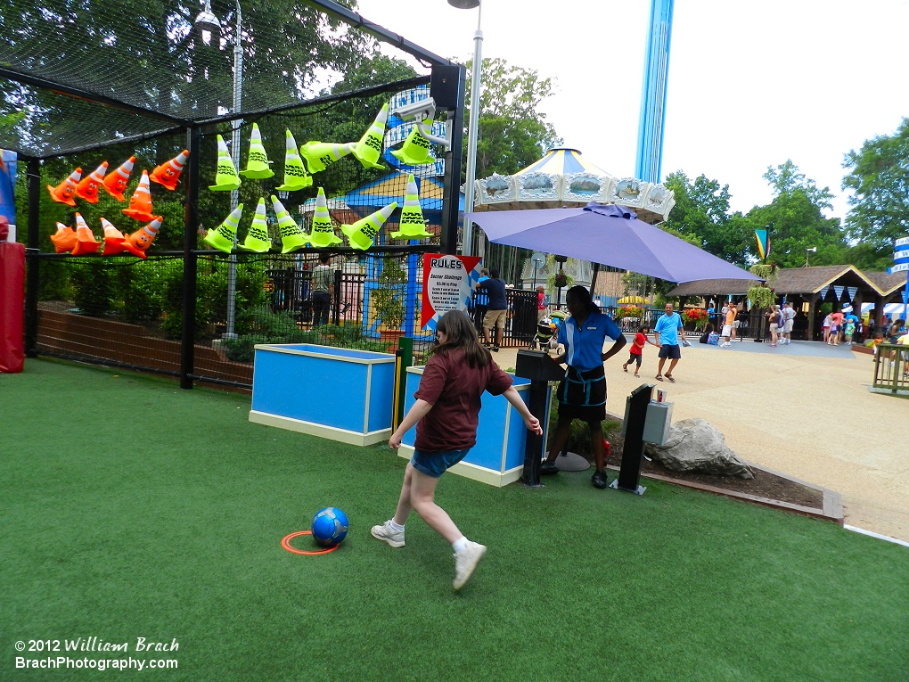 Laura trying her skills at a soccer game at Busch Gardens.