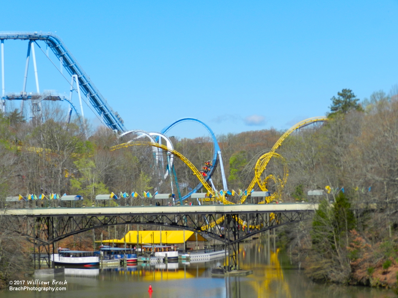 Closer look at the park with a griffon train entering an inversion.