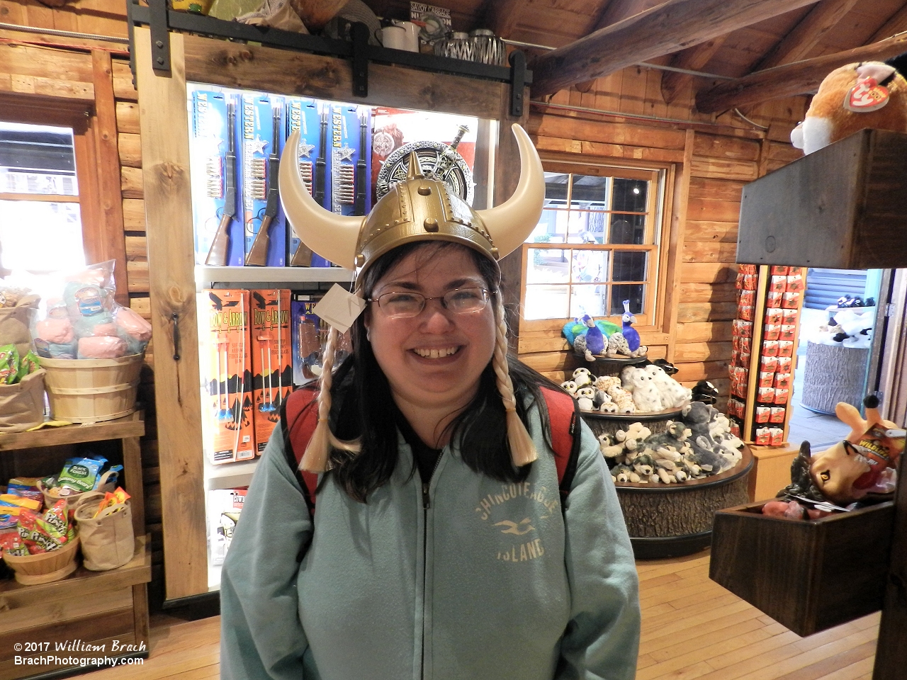 Laura trying out some of the unique InvadR Viking merchandise available at the park.