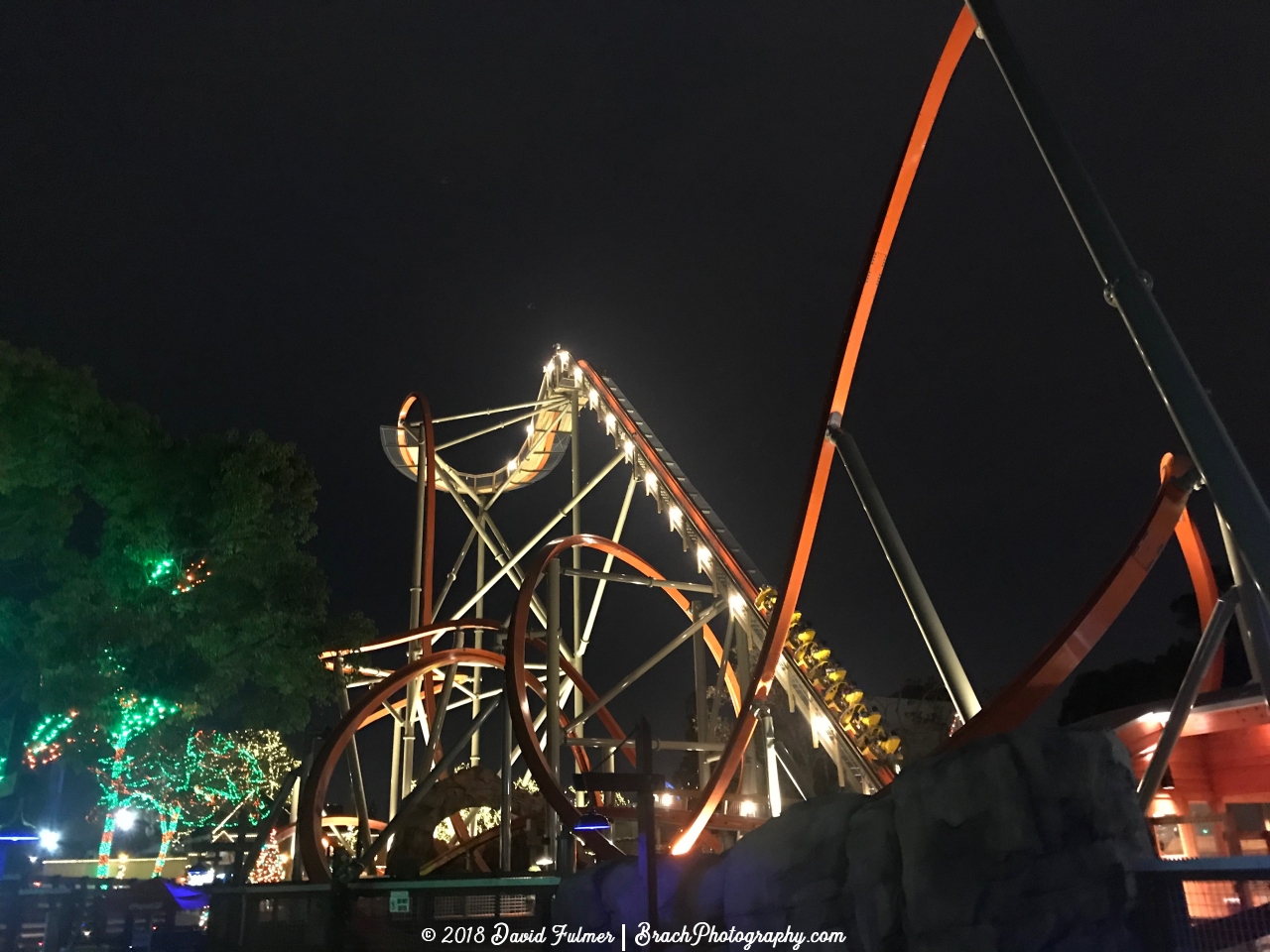 Train going up the lift hill on RailBlazer, a single rail coaster from Rocky Mountain Construction (RMC).