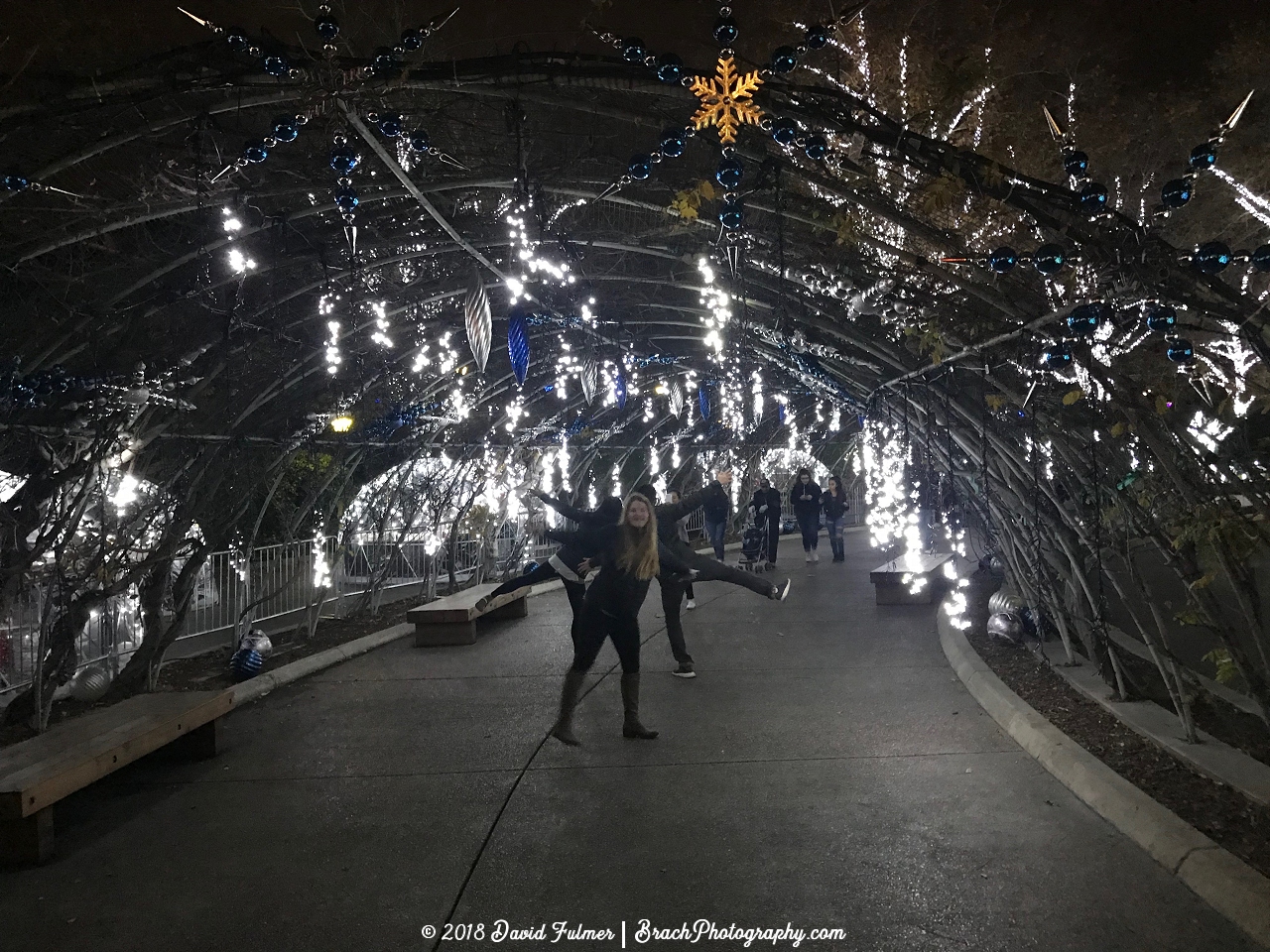 Marlena posing for a photo in the Arctic Alley area of the park during WinterFest.